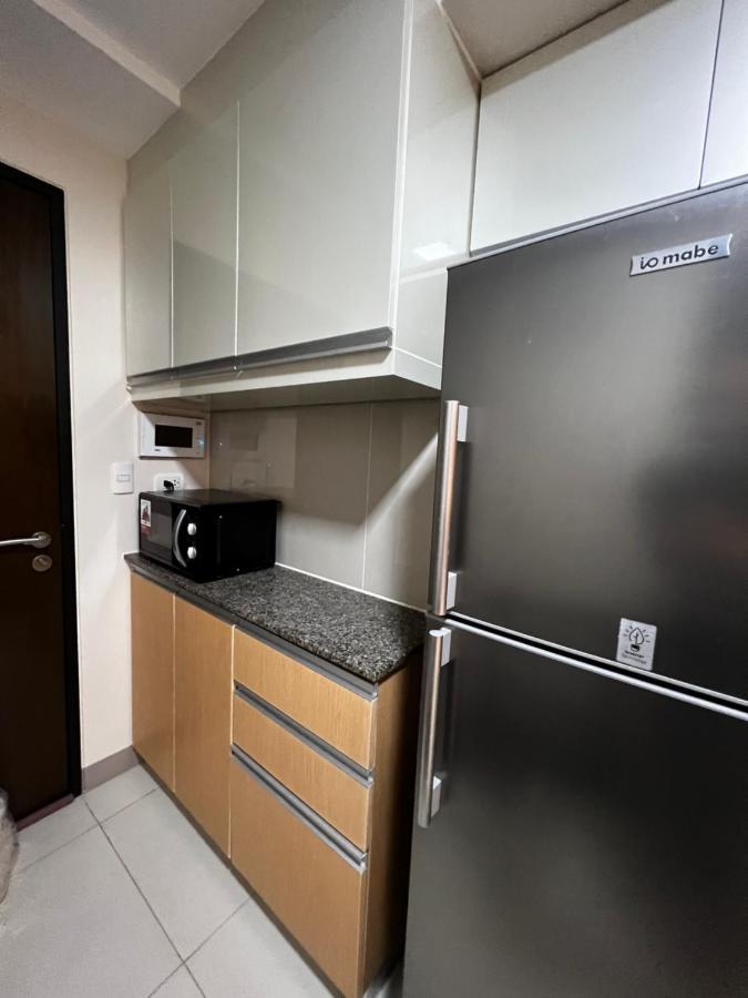 1 Bedroom Uptown Bgc Across Uptown Mall Manila Esterno foto